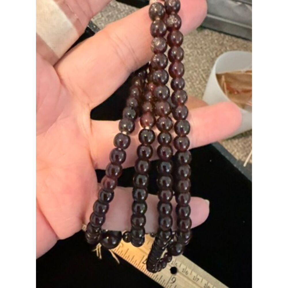 vtg glass beads amber yellow color on string with a couple larger beads as well